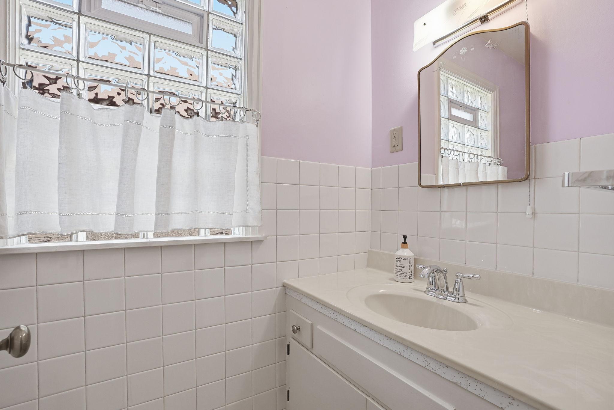 Main level half-bath by mudroom