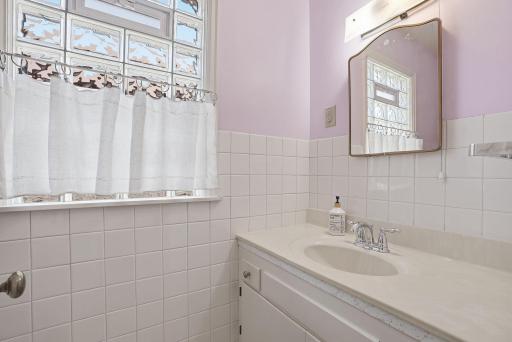 Main level half-bath by mudroom