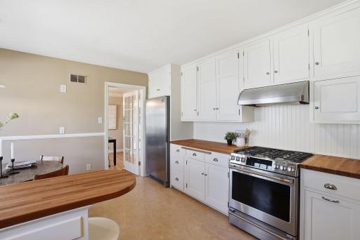 Kitchen with gas range & Vent-A-Hood