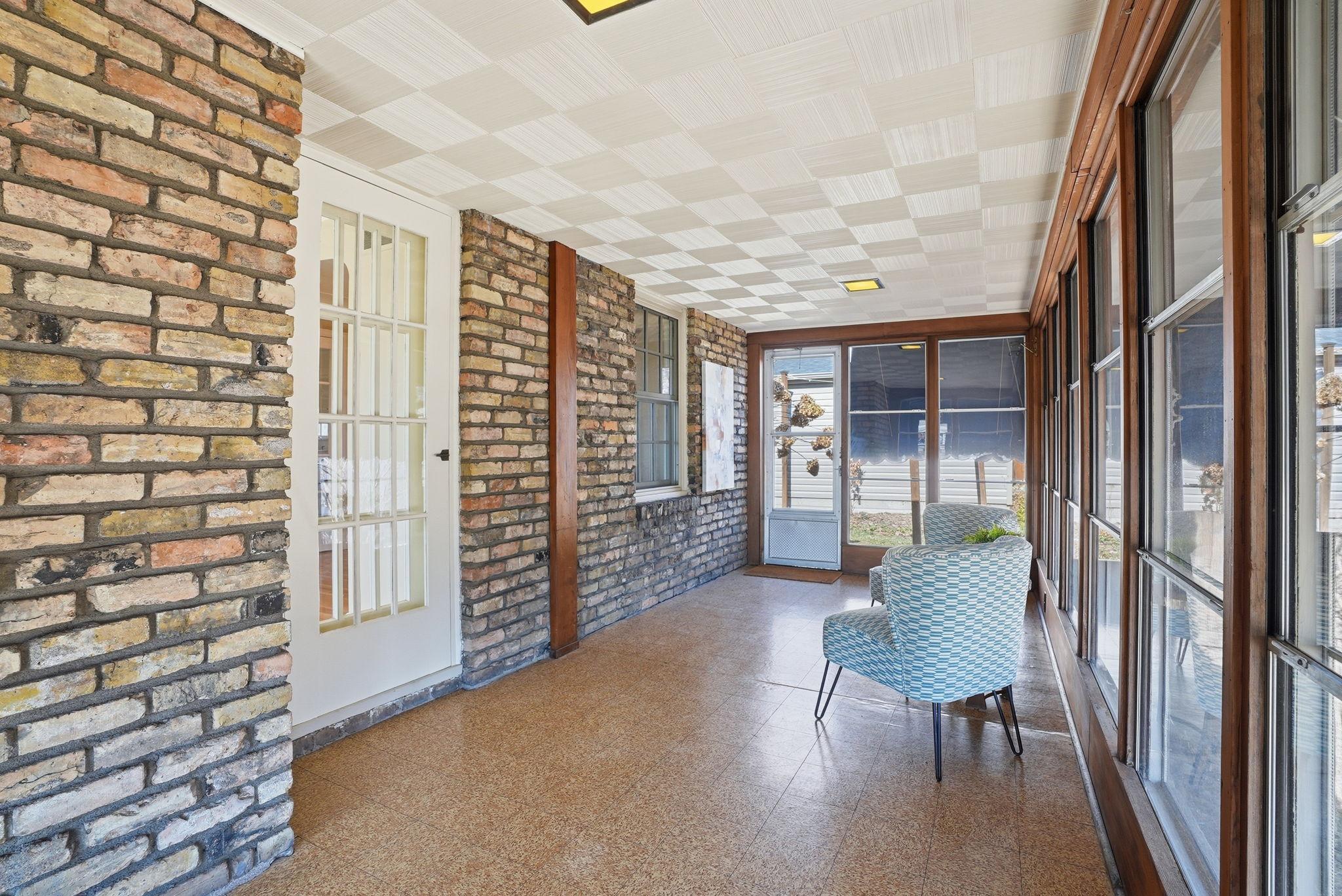 Three season porch & door to backyard