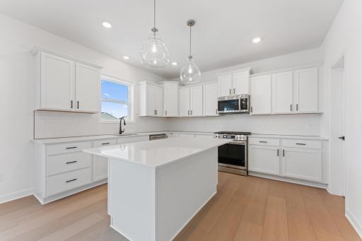 (Photo of a similar home, actual finishes may vary)