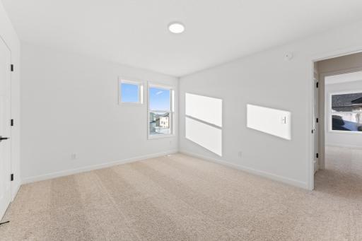 (Photo of a similar home, actual finishes may vary)