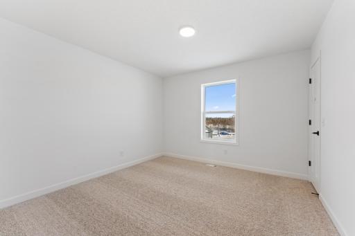 (Photo of a similar home, actual finishes may vary)