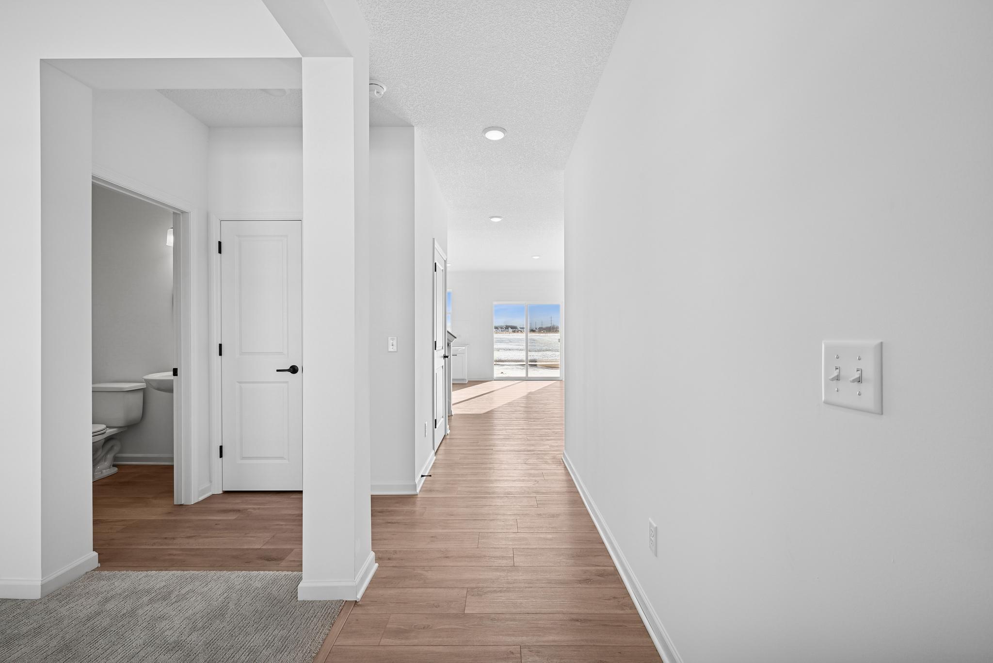 The welcoming entryway sets the tone for the home with a warm and inviting first impression. **Photo of similar home**