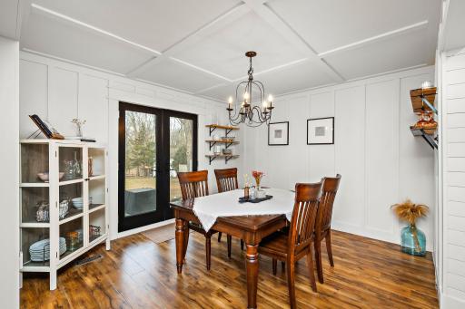 Dedicated dining area steps out to backyard