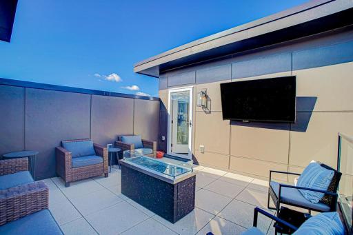 Another view of this impressive outdoor space. Water hookup for ease of watering if you like to grow seasonal flowers or plants.