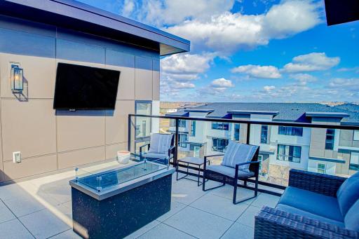 Gas fireplace for warmth & ambiance. TV for watching games and shows al fresco. Everyone will want to hang out at your place!