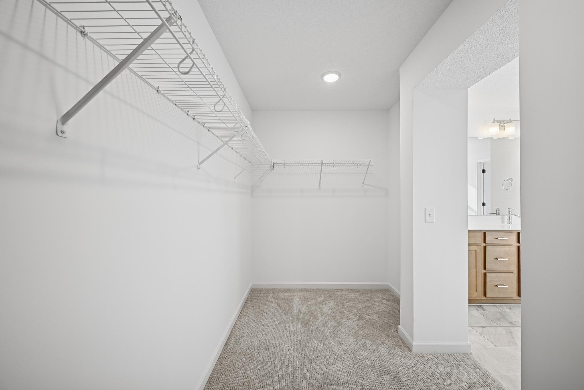 Generous walk-in closet **Photo of similar home**