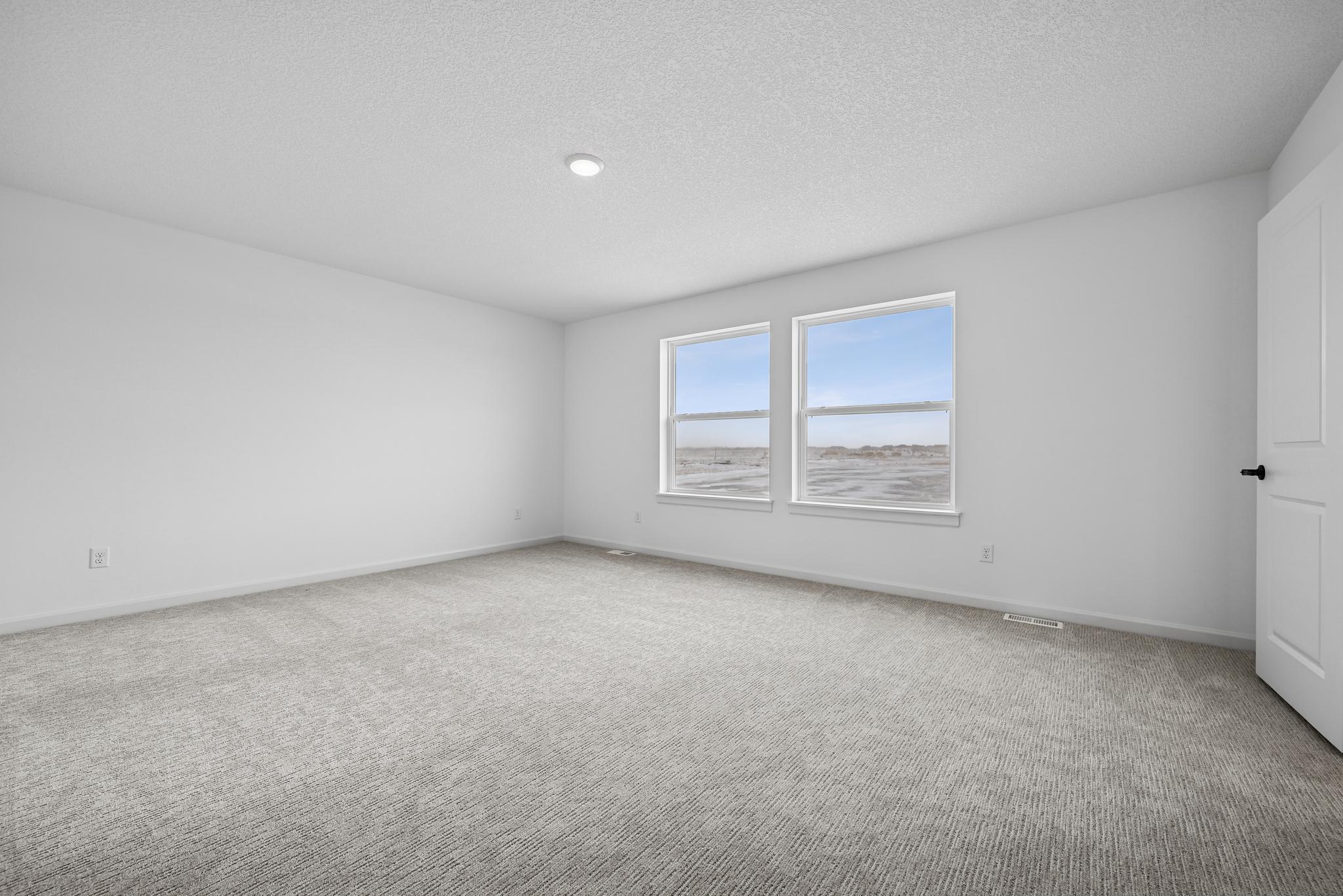 The Owner’s Retreat provides a peaceful escape from the day, offering a spacious and comfortable bedroom designed for rest and relaxation. **Photo of similar home**