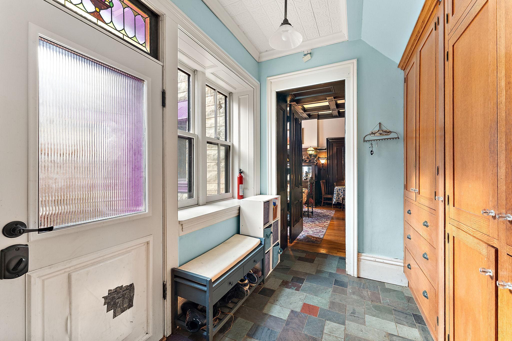 Dining Entrance to Kitchen and Door to Back Patio