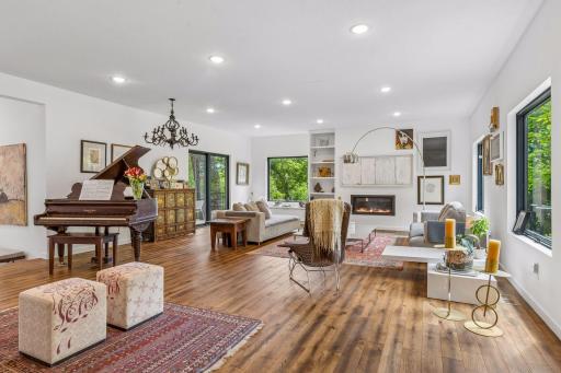 Spacious living room area with access to upper deck area