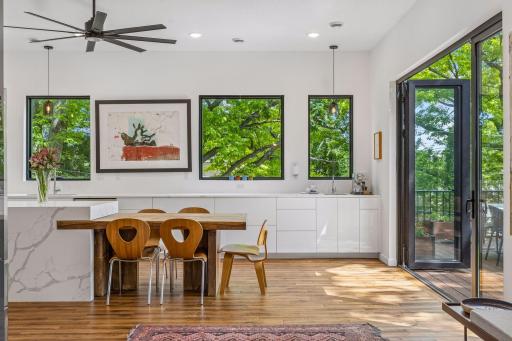 The large windows throughout, bring the outdoors in