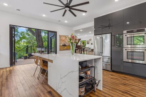 Kitchen with view to the lovely outdoor space