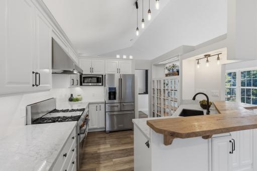 Built-in hutch with glass doors and accent lighting