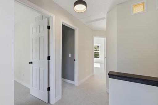 The Upper Level features 3 Bedrooms and 2 Bathrooms