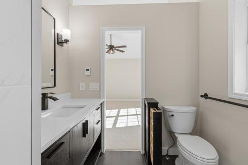 Unique built-in pull-out storage in 1/2 wall. Luxury vinyl plank flooring with radiant in-floor heating