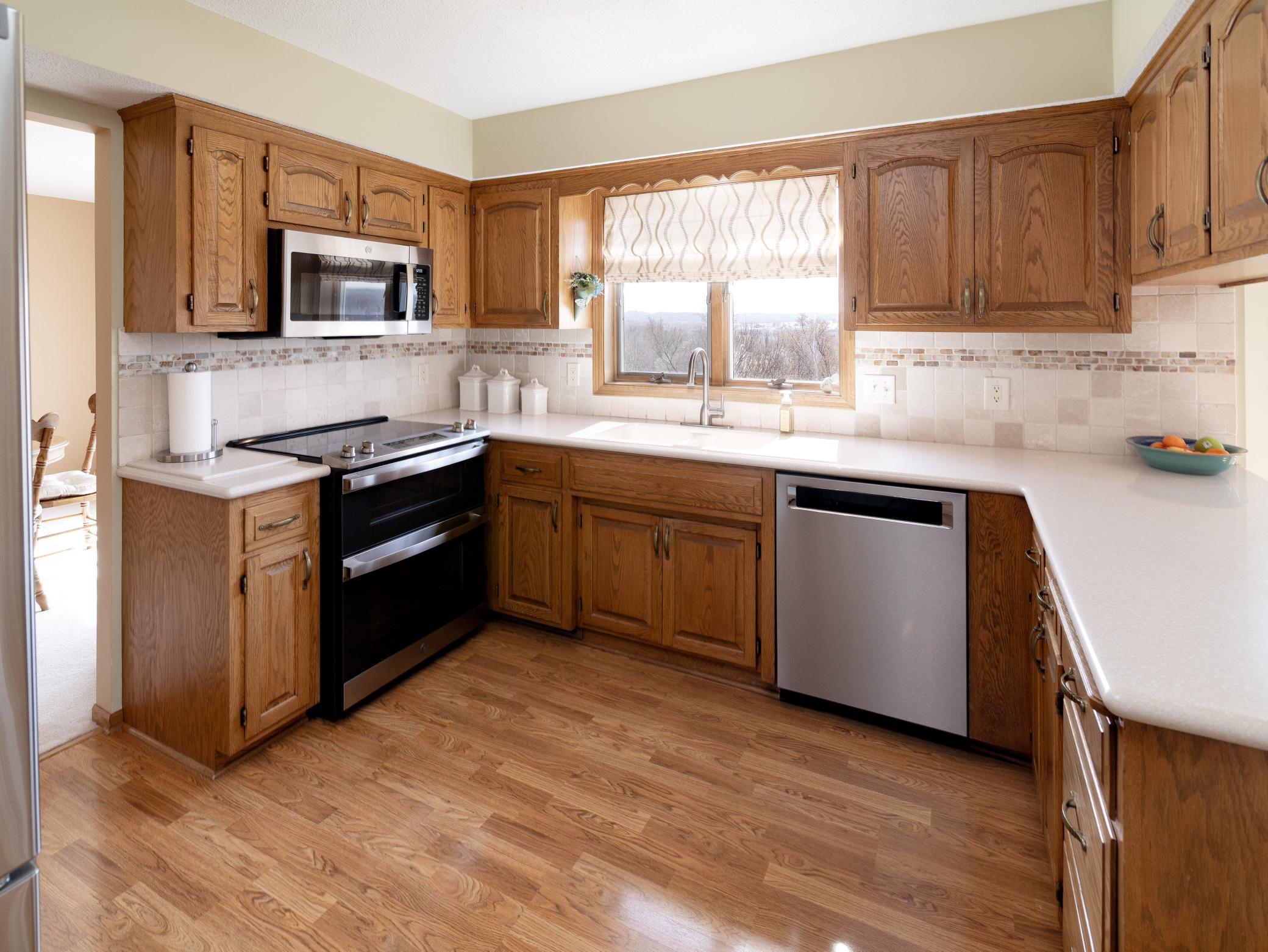 Functional and well-kept kitchen with plenty of space to cook, gather, and make it your own