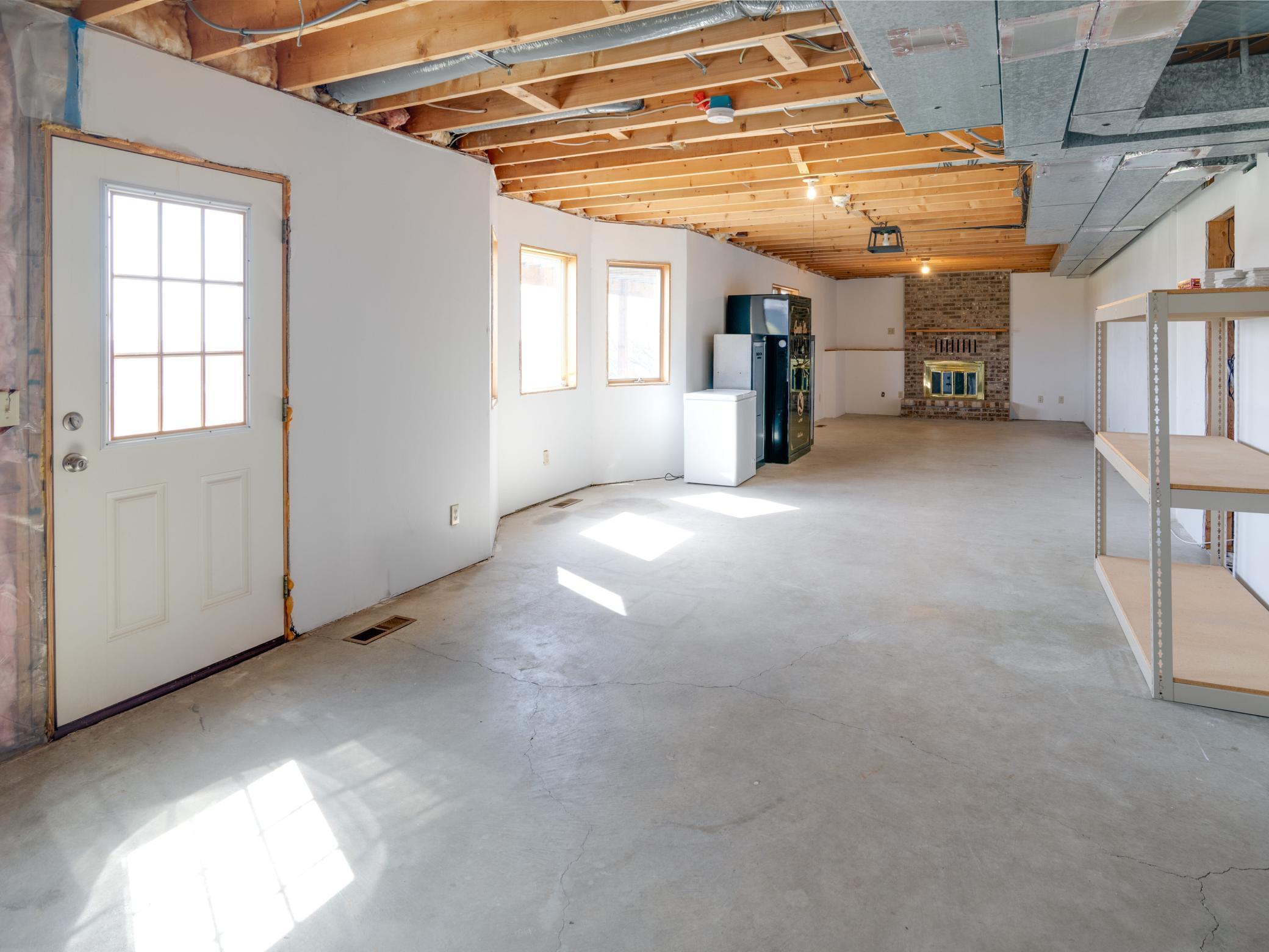 Unfinished walk-out lower level offers incredible potential to expand your living space and build equity. A full-bath is a roughed in as well.