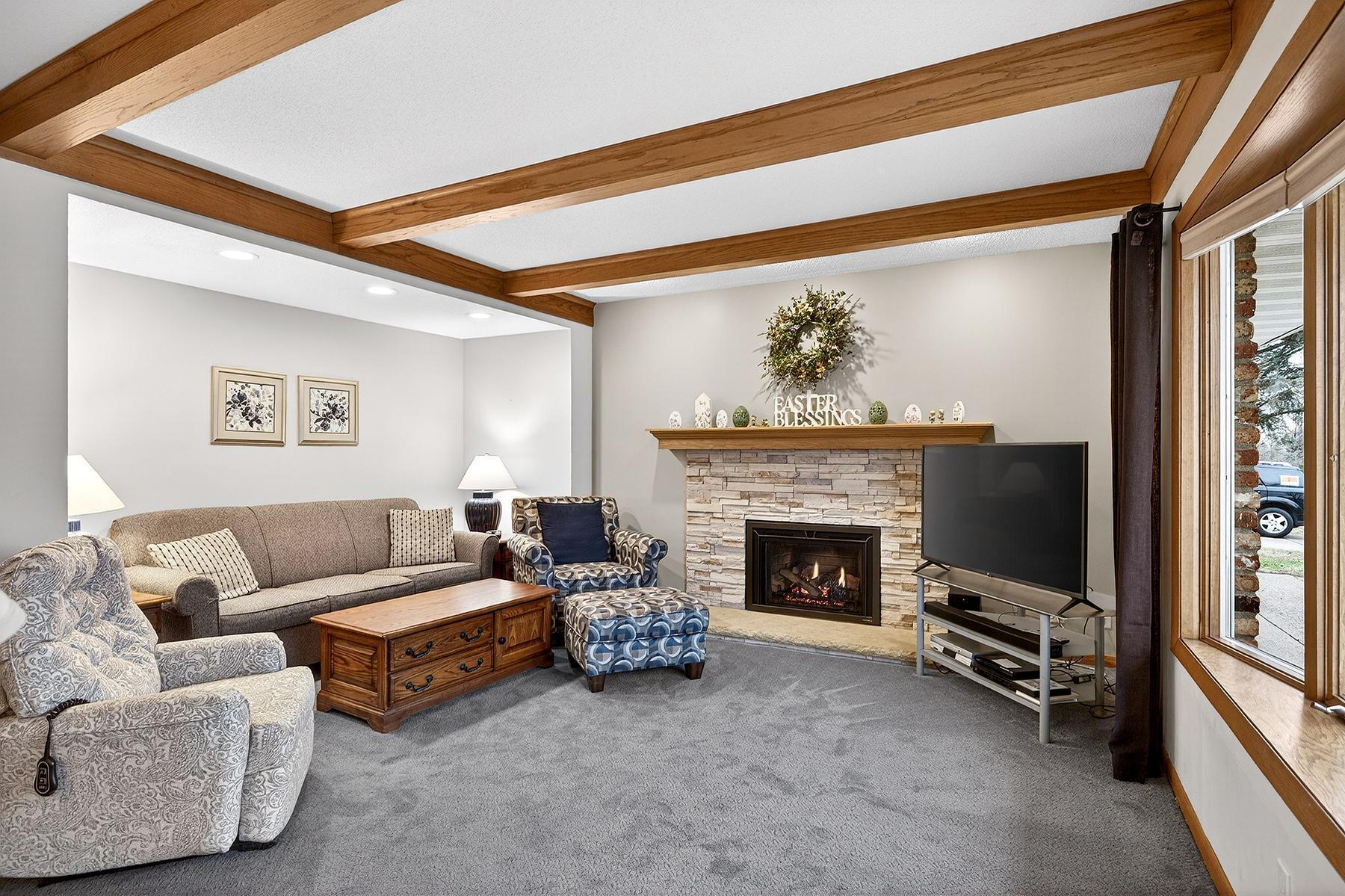 Showcasing Beamed Ceilings in Family Room