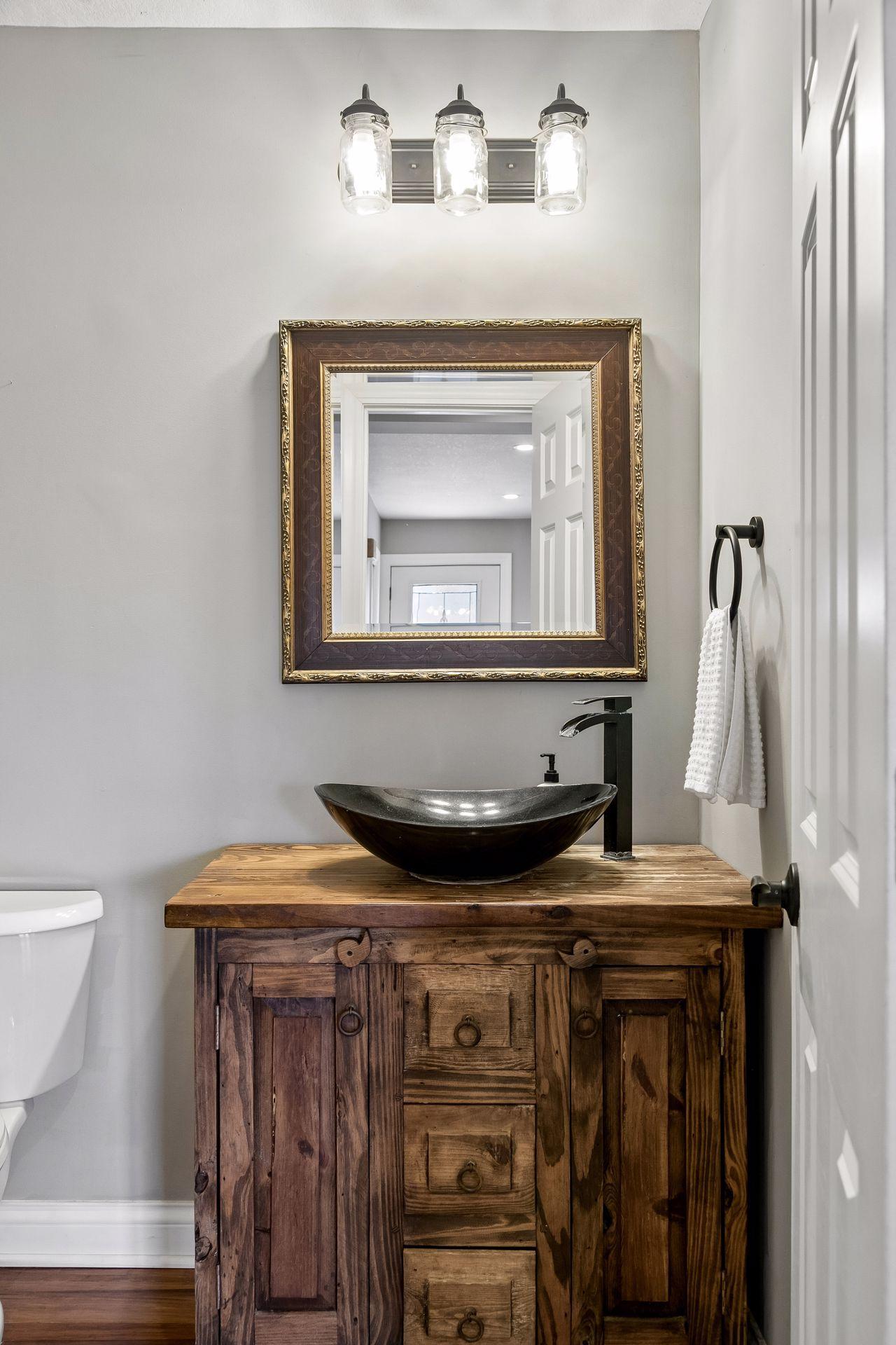 Main floor powder room with new toilet.