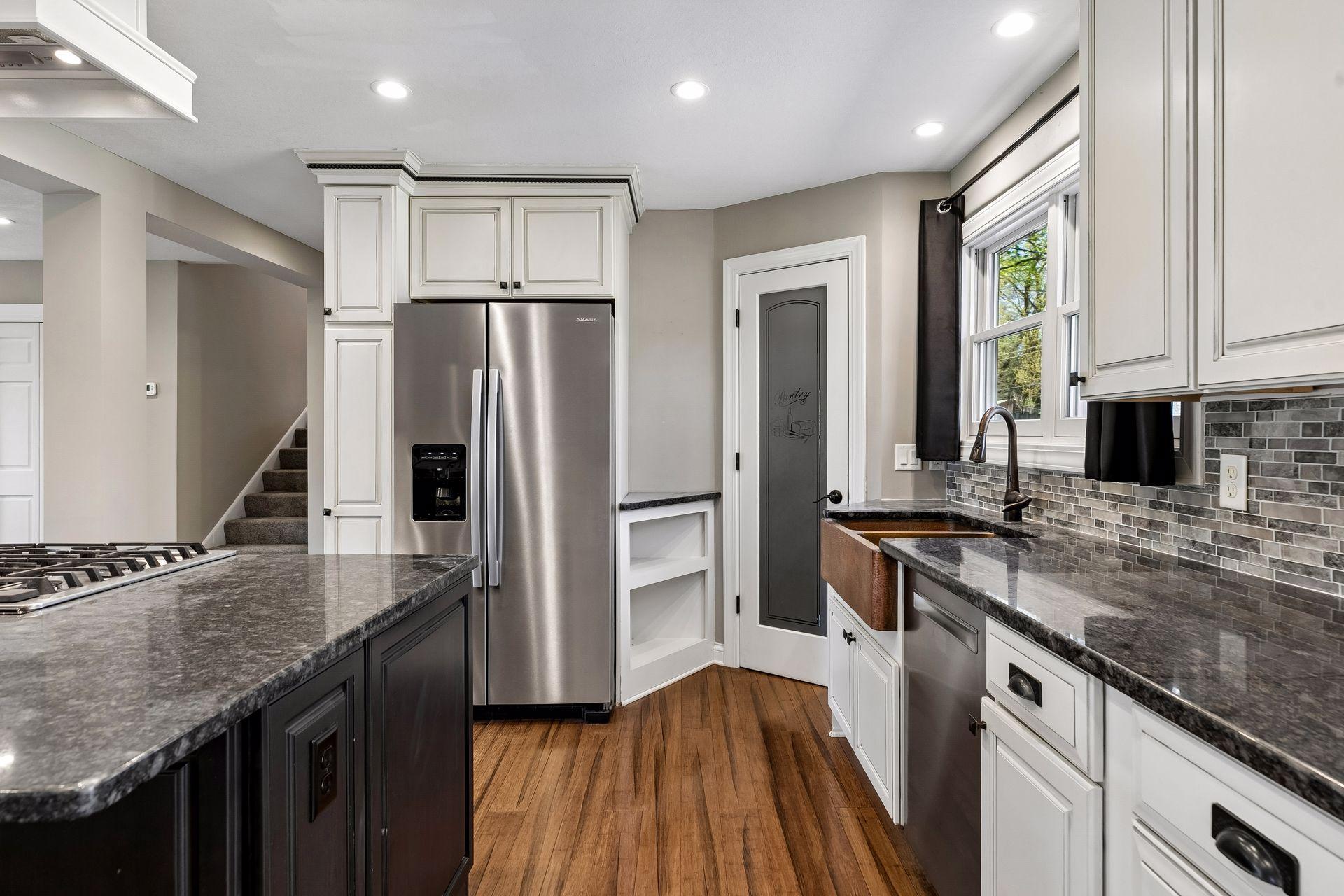 Exceptional cabinet and counter space plus a walk-in pantry.