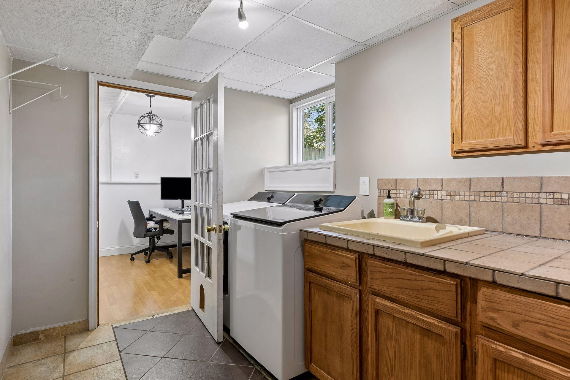 Laundry/mudroom with brand new LG washer and dryer.