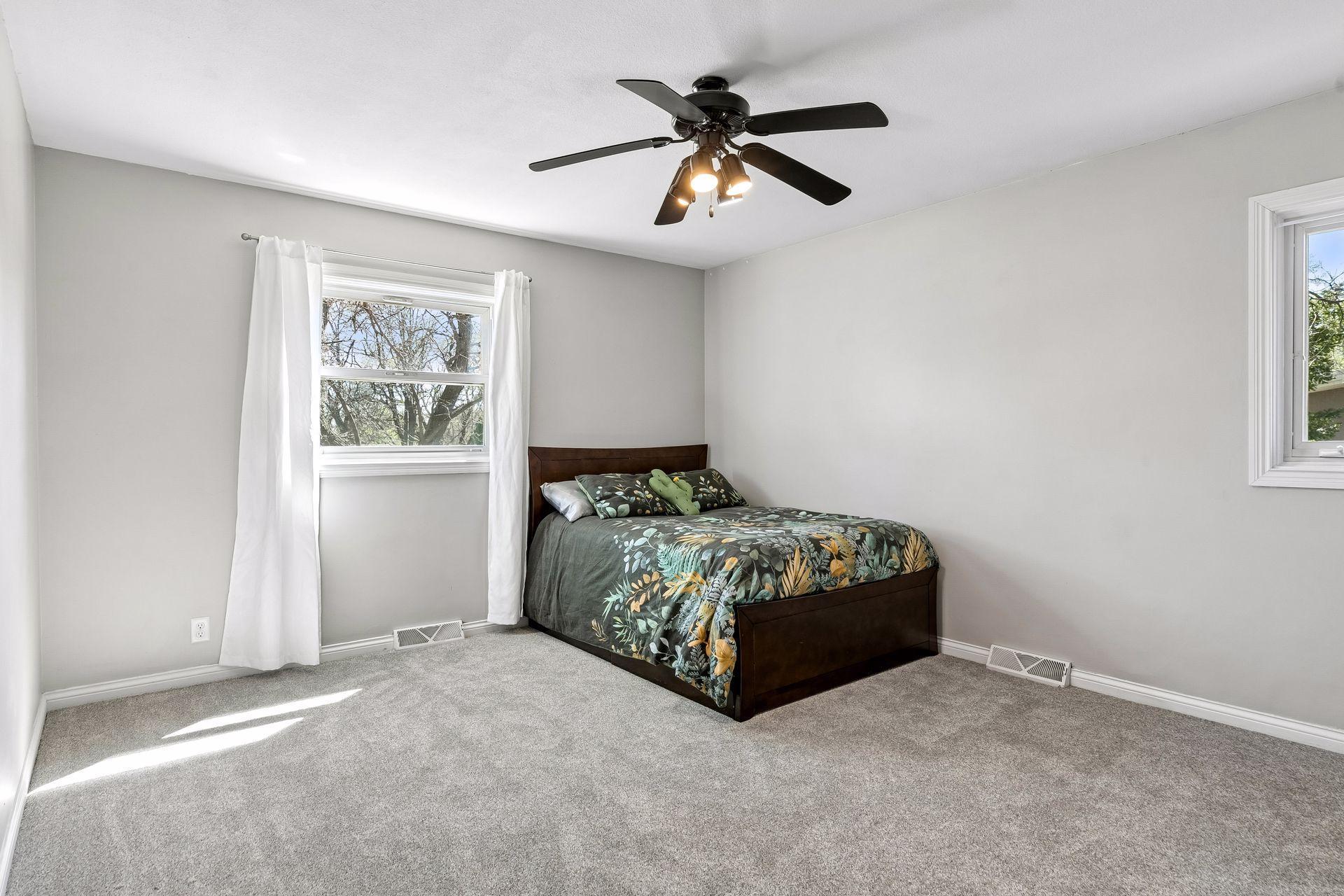 One of three bedrooms on the second level - brand new carpet.