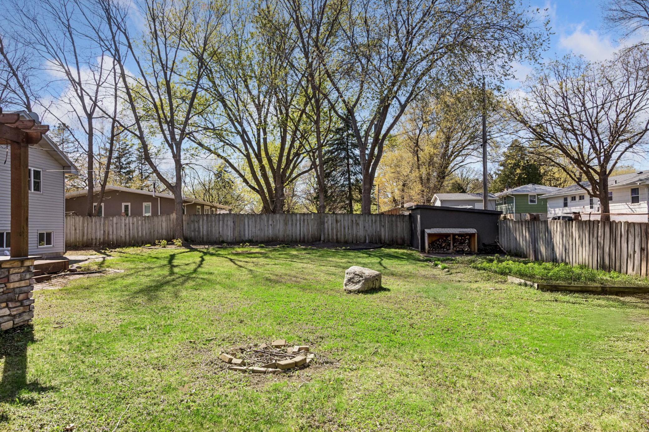 Fully fenced, private backyard with tons of space for kids, adults and pets to play.