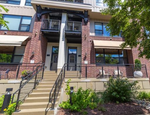 Welcome home to 190 Elm! Unique multi level condo just steps from the River!