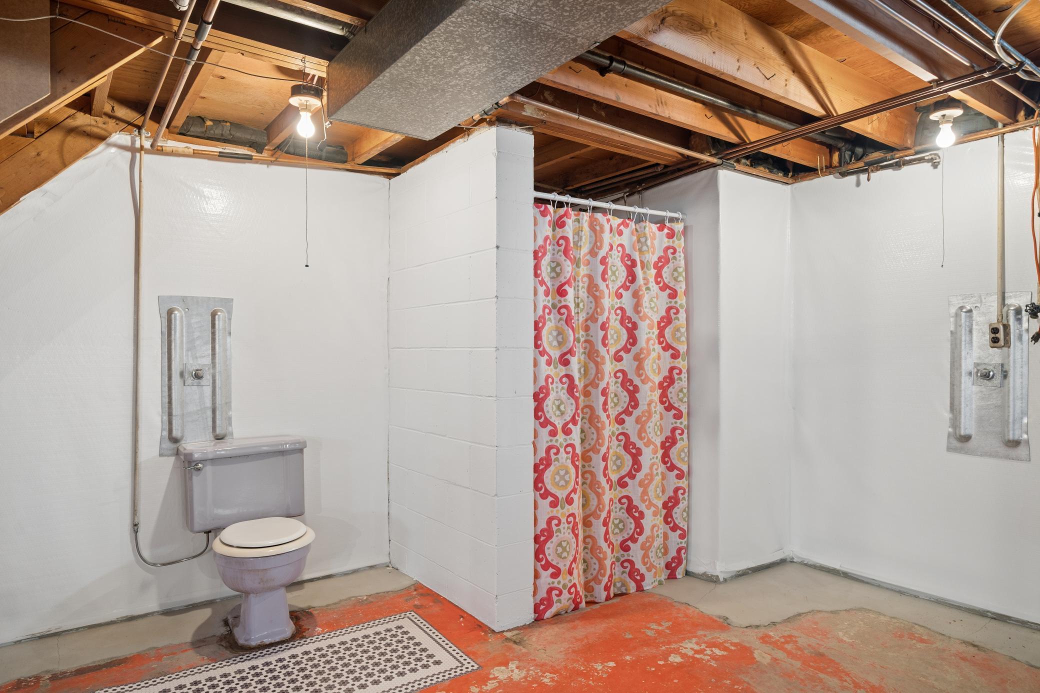 Partial bath ready to be finished in the lower level