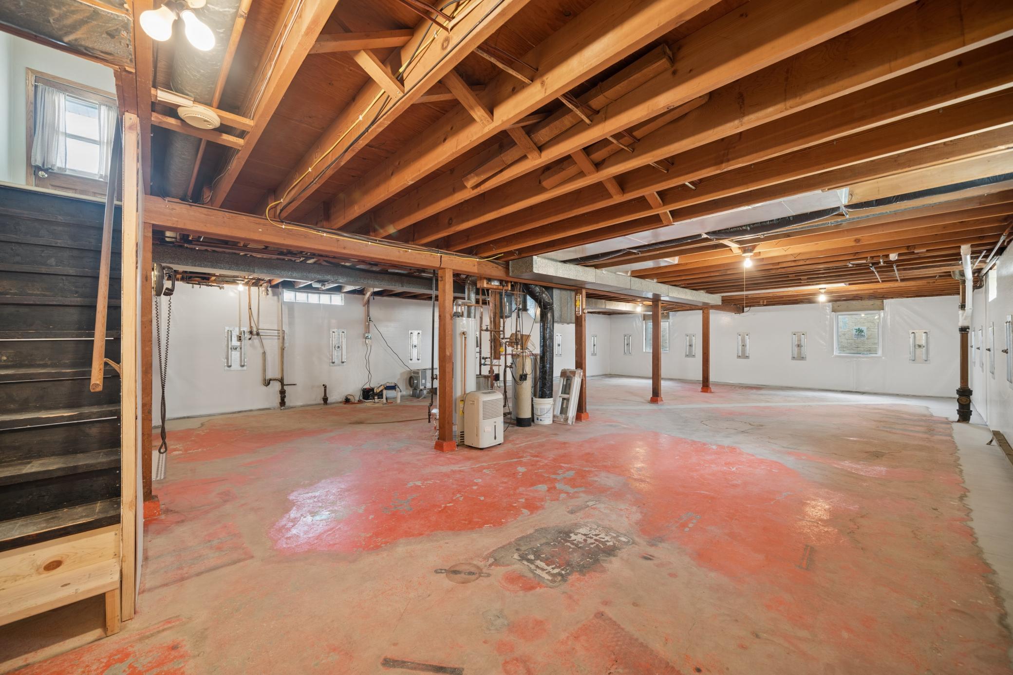 Unfinished lower level with 2 egress windows