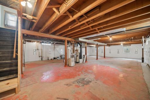 Unfinished lower level with 2 egress windows