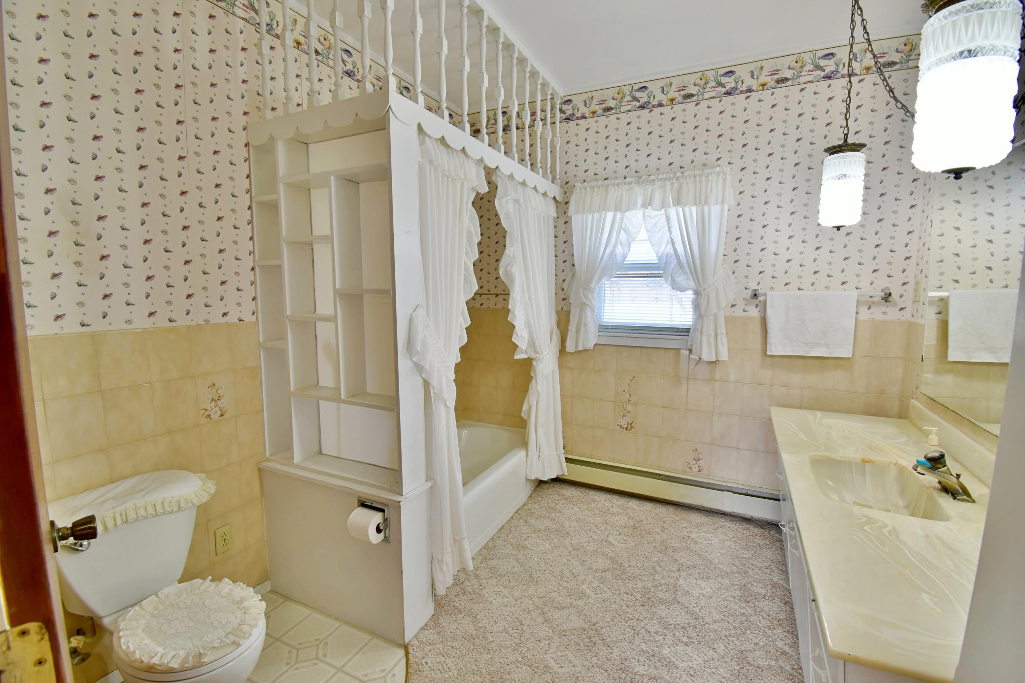 Very spacious bathroom right off the living room and dining room