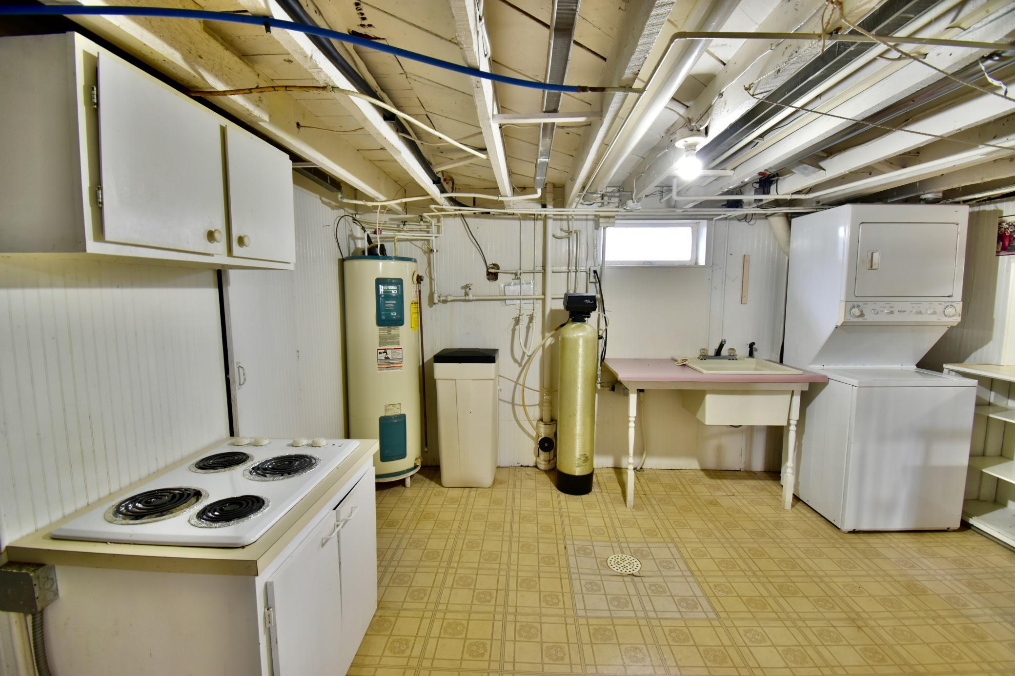 Utility area also has an additional cooktop great for canning or entertaining