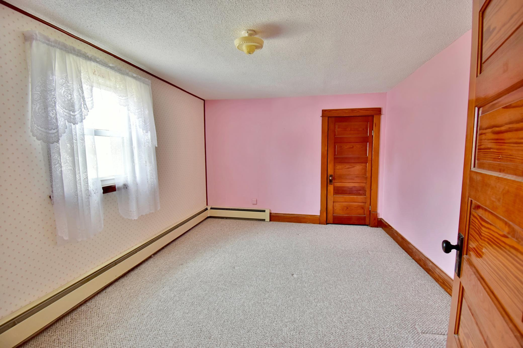 One of the upper level bedrooms