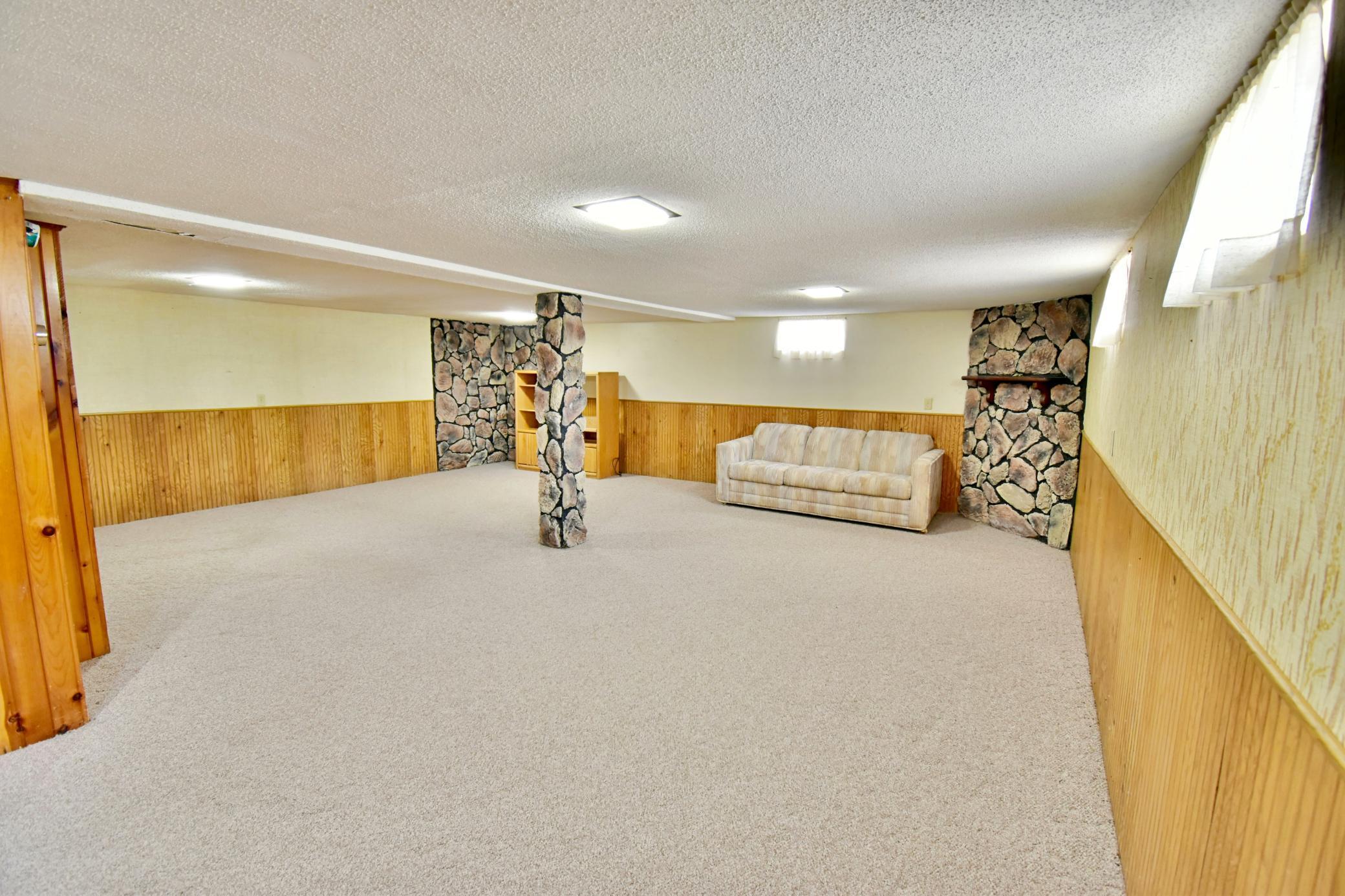 Very large family room in the lower level has so many options - pool table, theater area, or you could even add another bedroom!