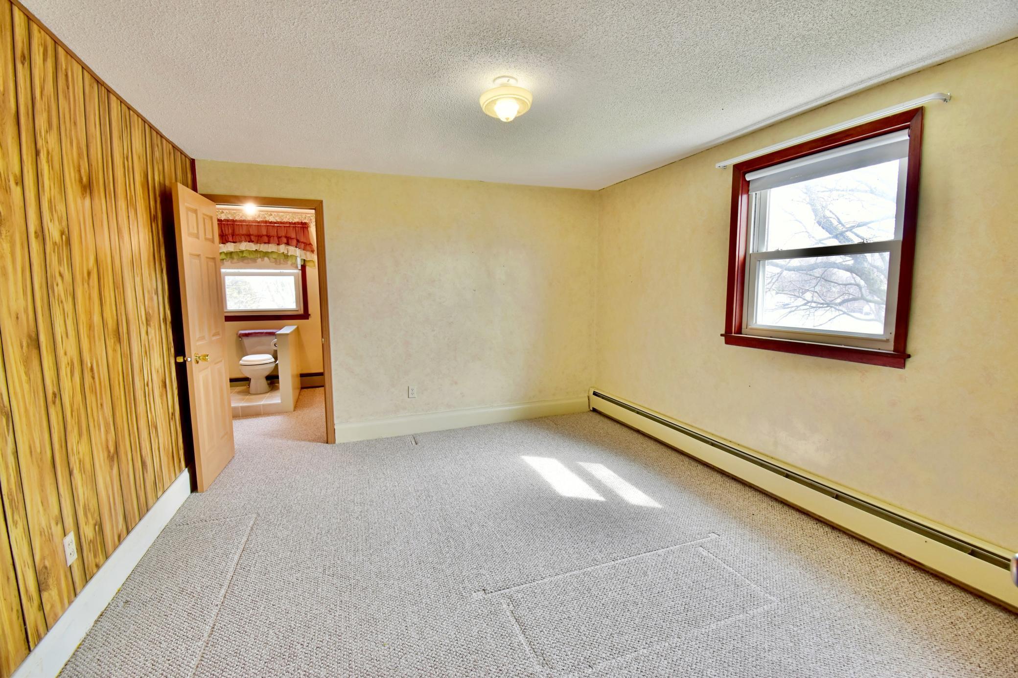This bedroom also has it's own entrance to the bathroom