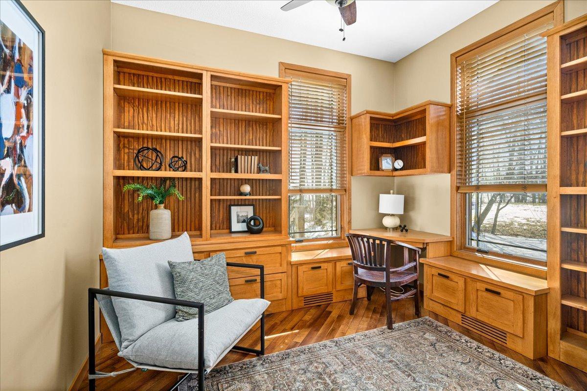 Den with back yard views of pristine woods