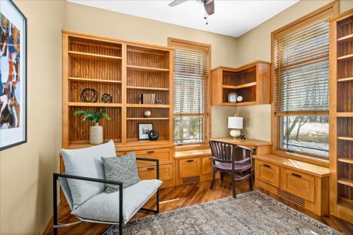 Den with back yard views of pristine woods