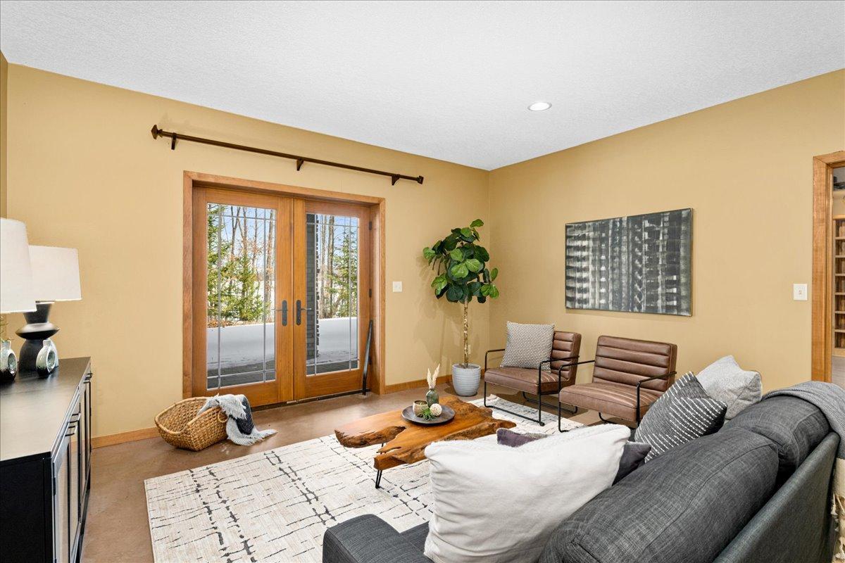 Family room with walkout to patio area and footpath to lake.