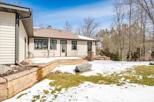 South side of house has outdoor living area and tons of privacy