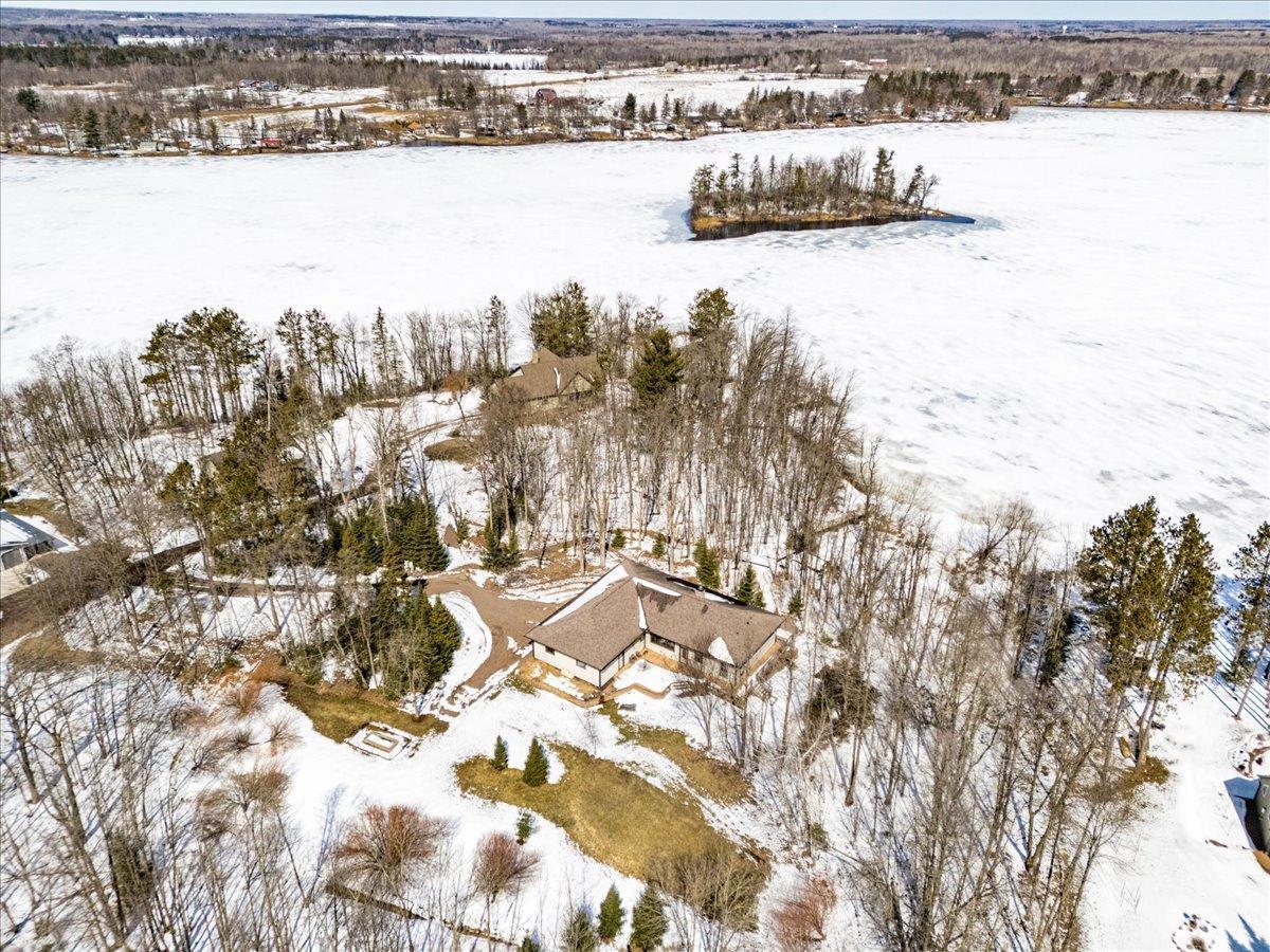 On the point and across from the Island of Island Lake