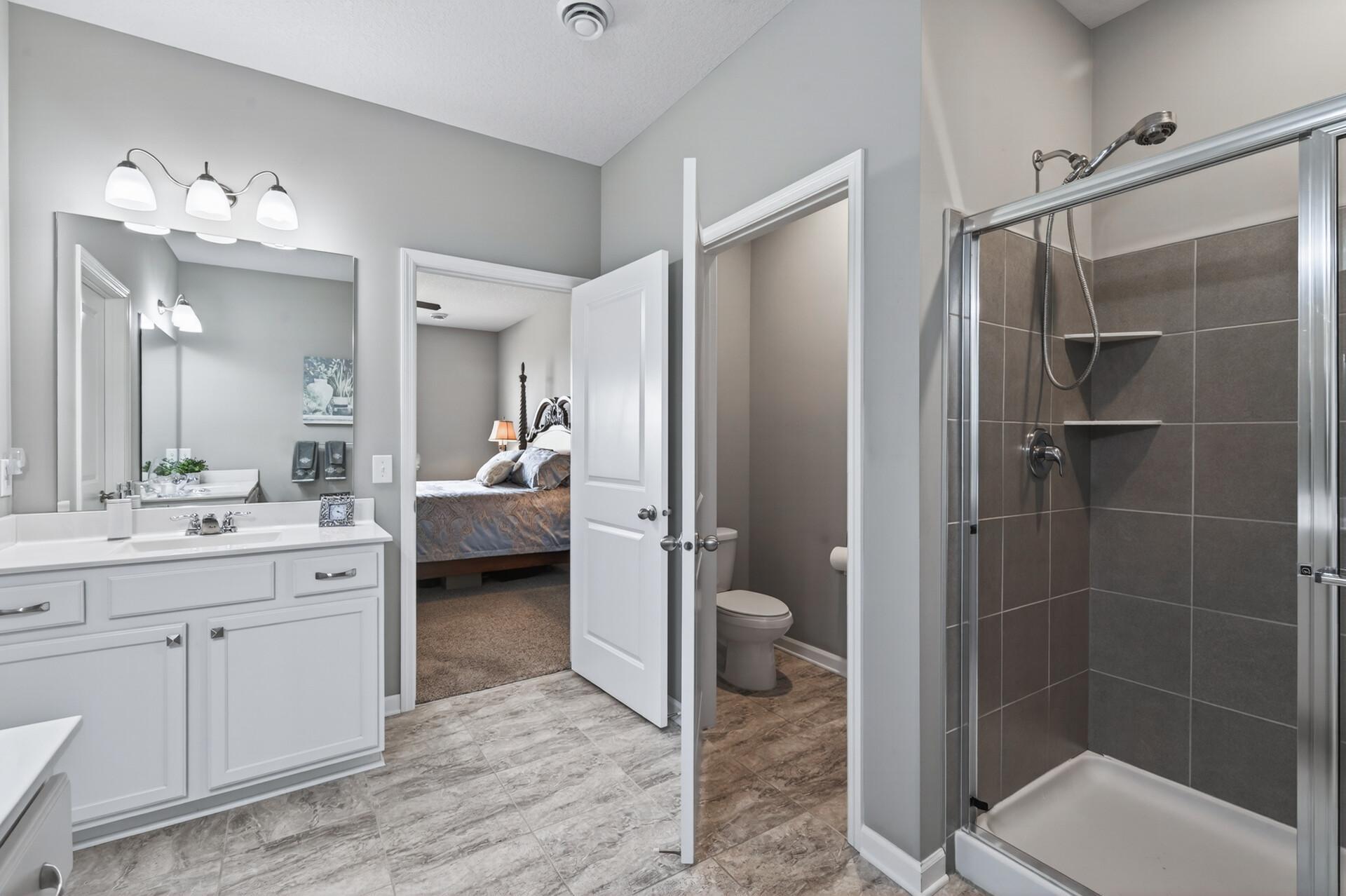 Spa-like shower with pristine tile surround.