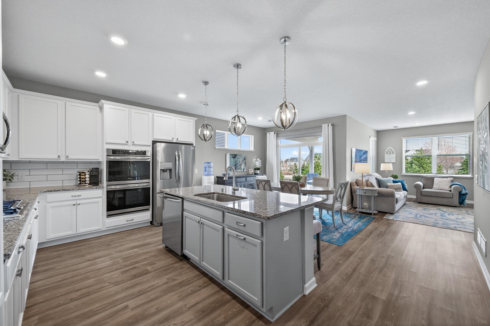 Open-concept floor plan with seamless flow between living, dining, and kitchen areas. Perfect for entertaining!