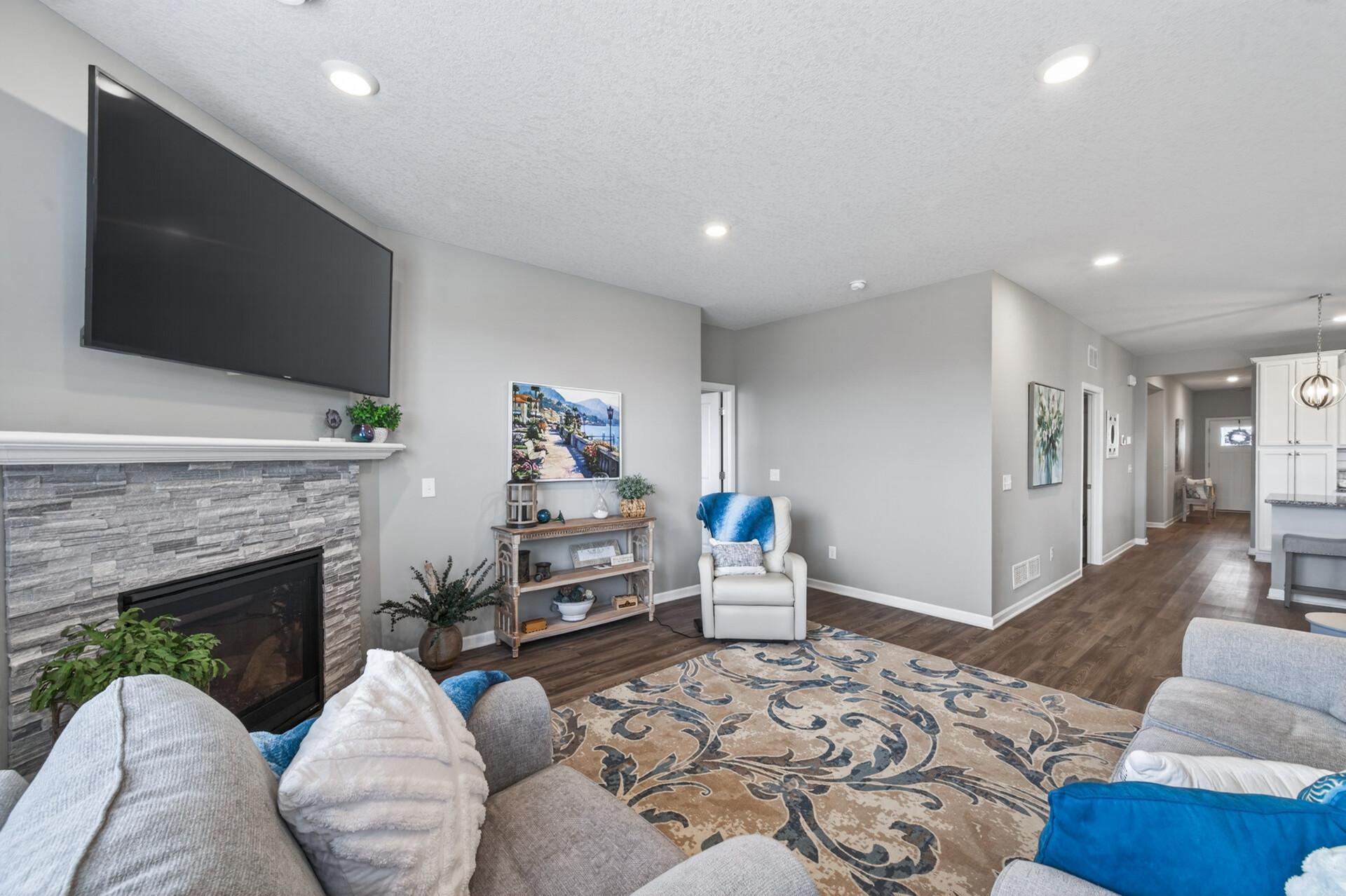View from the living room. Look at those gleaming laminate floors, everything is beautiful and pristine in this home. This home will not dissapoint!