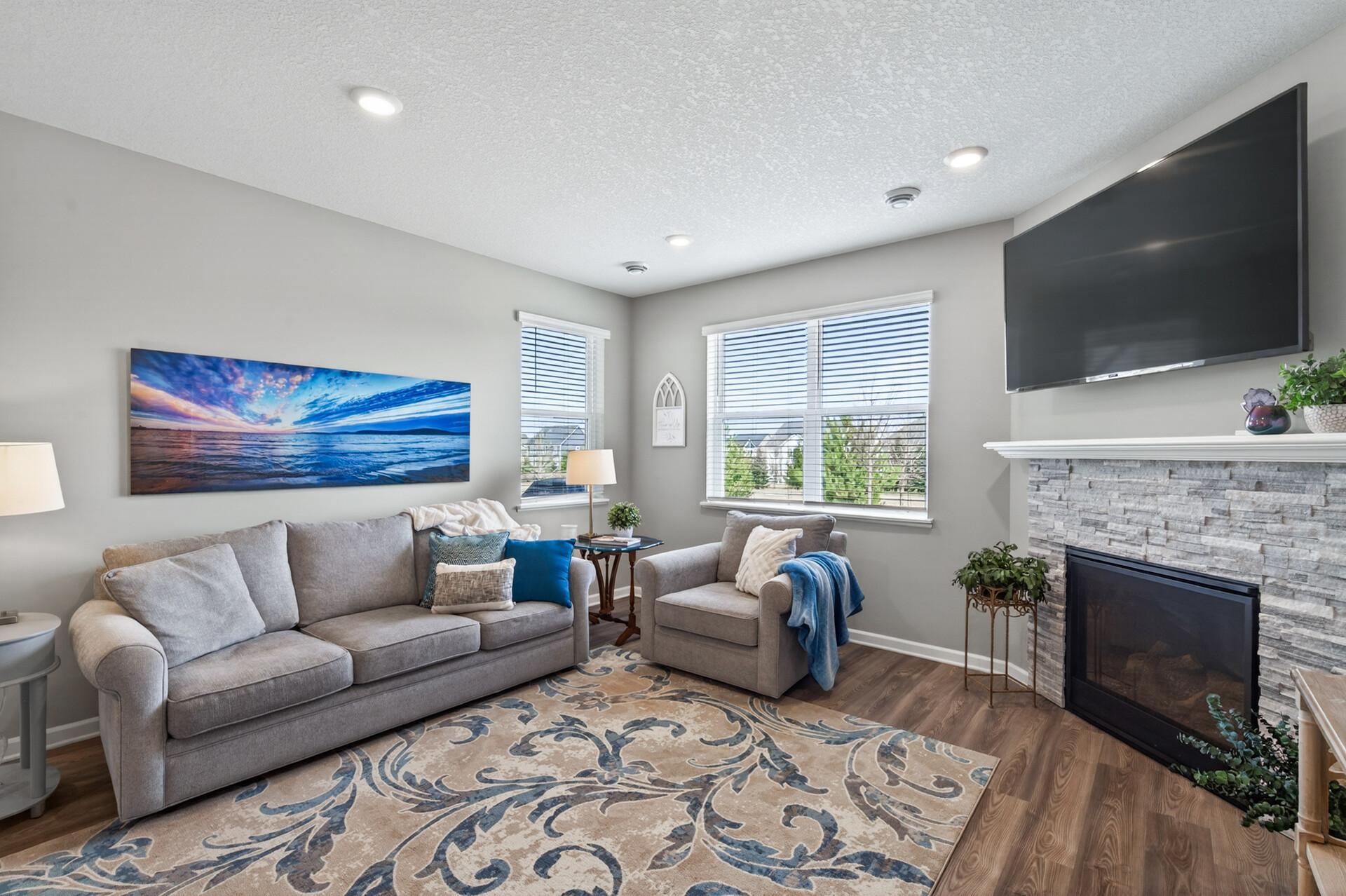 Double corner windows offer this living room tons of natural light!