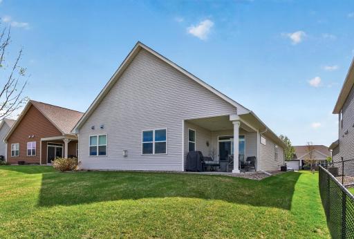 Walk straight out for yard games! This home makes living easy! Lawn care is covered by the HOA! Enjoy shade at the end of the day.