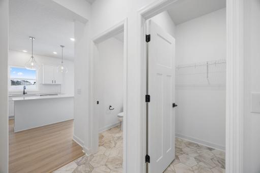Easily access a walk-in closet right from the mudroom.