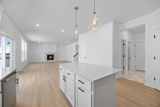 The center island doubles as a breakfast bar, ready for casual meals and entertaining