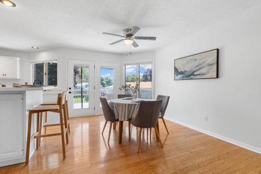 Open concept layout with direct flow from living room to kitchen and dining area.